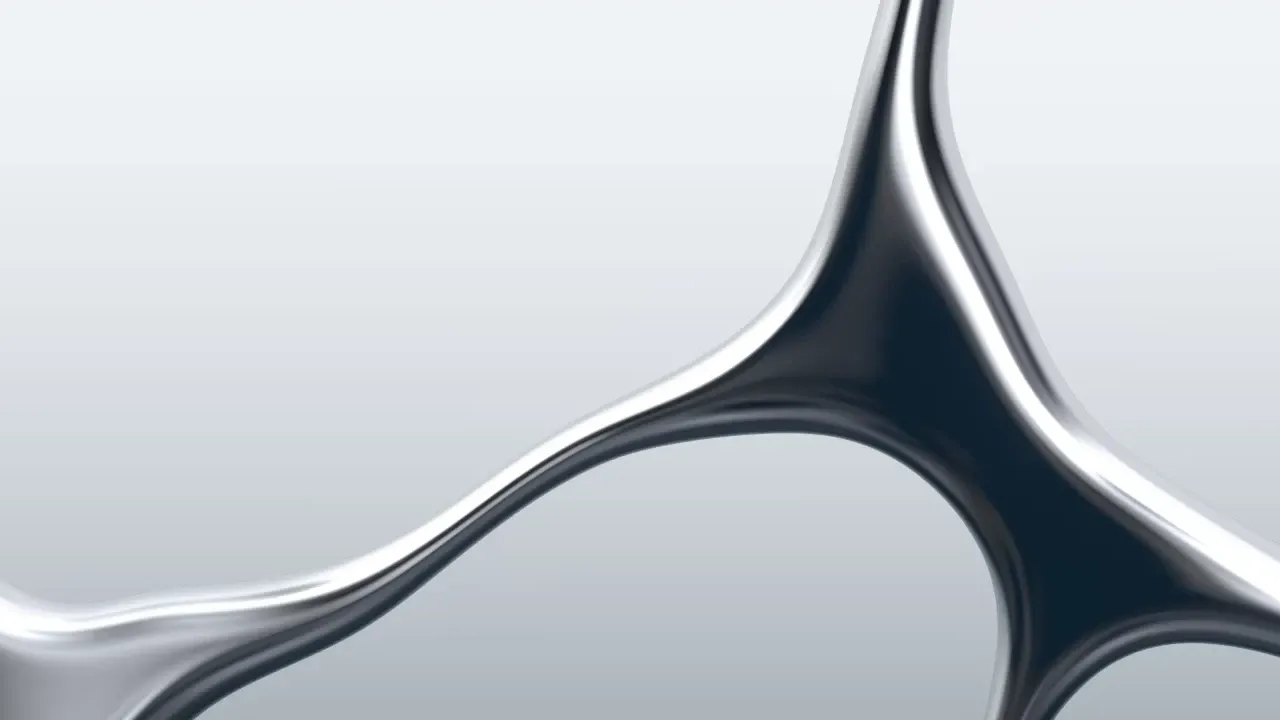 Close-up of one chrome junction, lit from above.